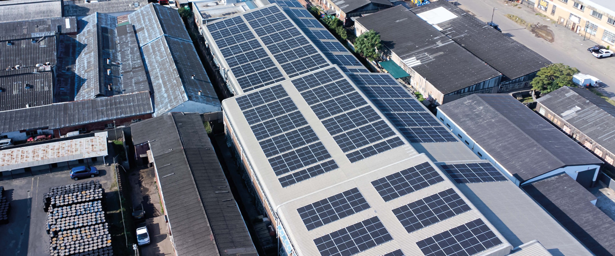 Large commercial solar panels installation, professionally installed. Proudly South African, Locally Made solar panels used on a commercial scale building in Durban South Africa.